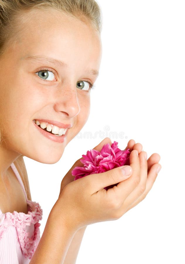 Pretty teenager girl with flower in hands