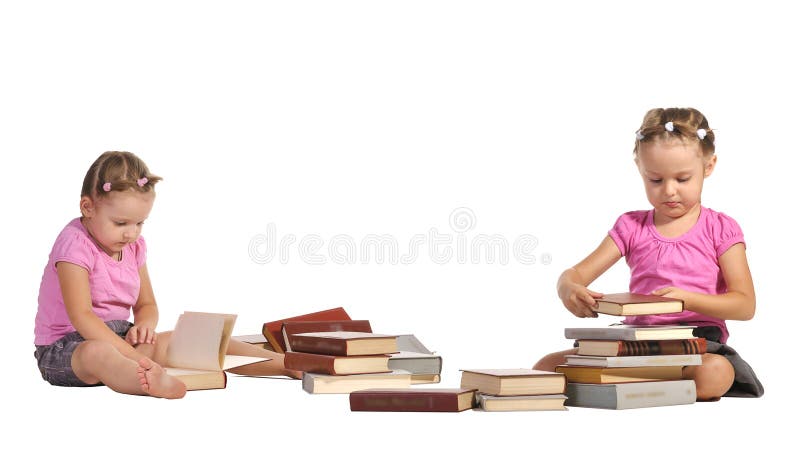 Pretty twins girls with pile of books isolated