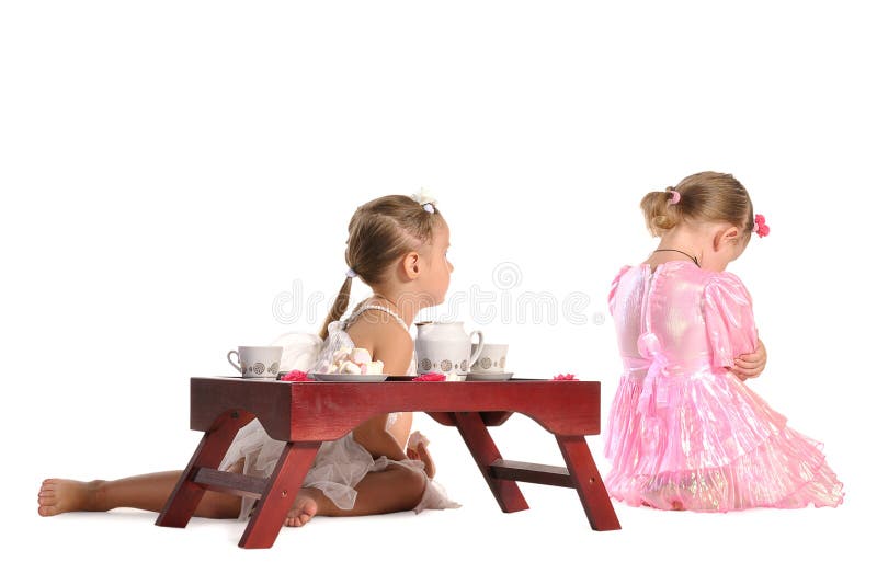 Pretty twins sisters have tea isolated