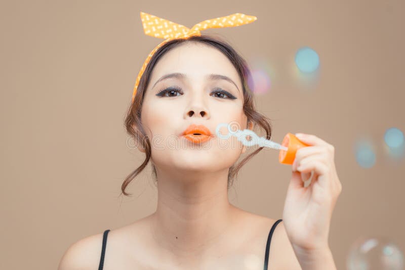 Pretty Woman Blowing Soap Bubbles Stock Photo Image of attractive