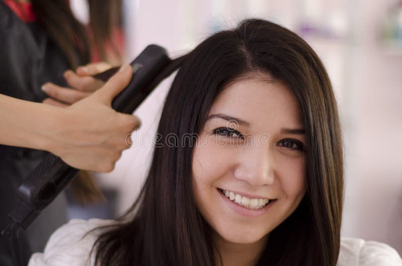 Pretty woman in a hair salon royalty free stock images Pretty woman in a hair salon royalty free stock images