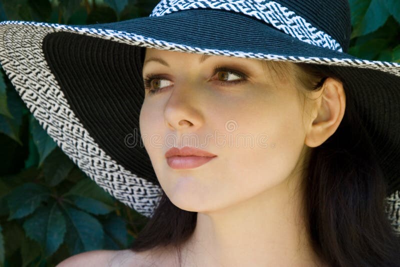 Pretty woman in hat portrait