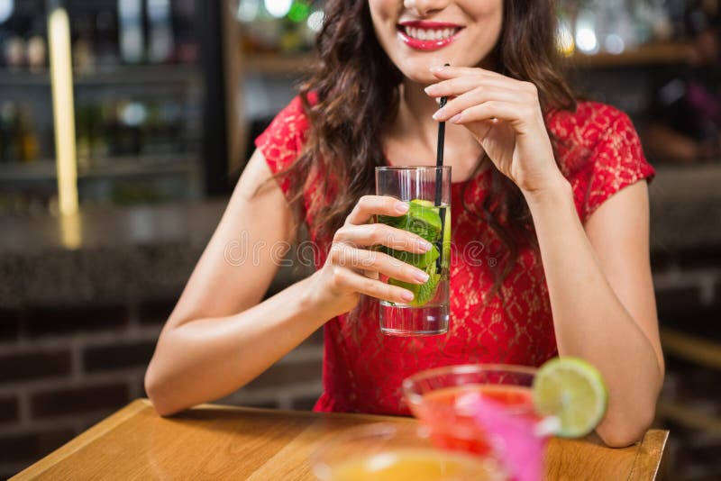 Pretty Woman Having a Cocktail Stock Image Image of leaning
