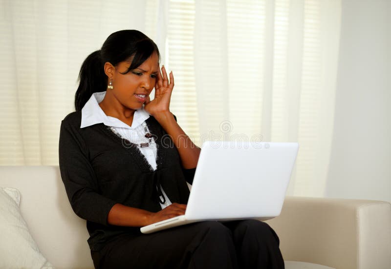 Pretty woman with headache working up to the limit stock images Pretty woman with headache working up to the limit stock images