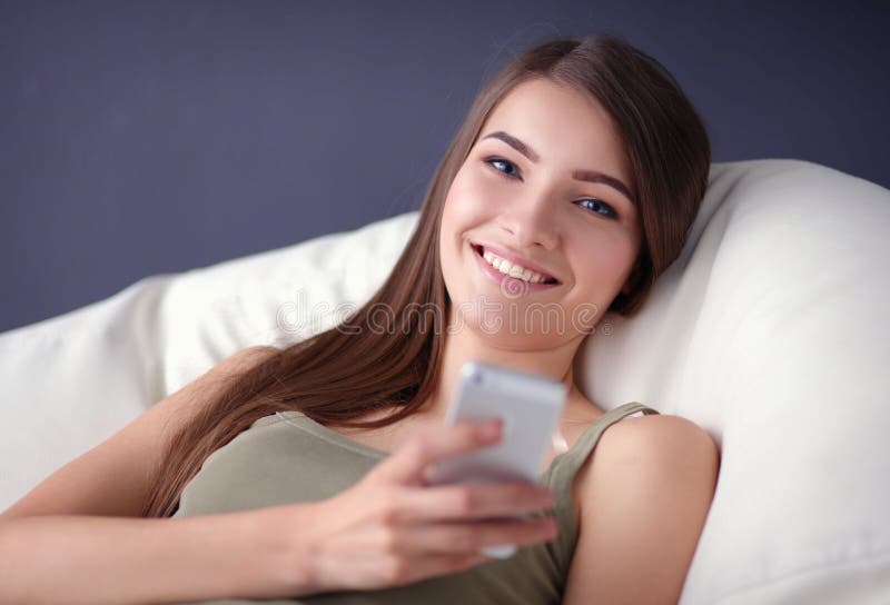 Woman On Couch In Living Room