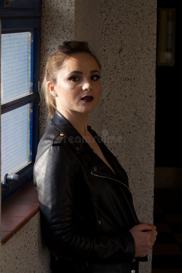 Pretty woman in leather jacket