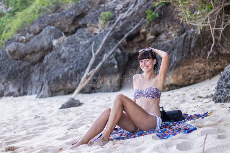Pretty Woman Posing On The Beach Near The Ocean Of Tropical Island Bali 