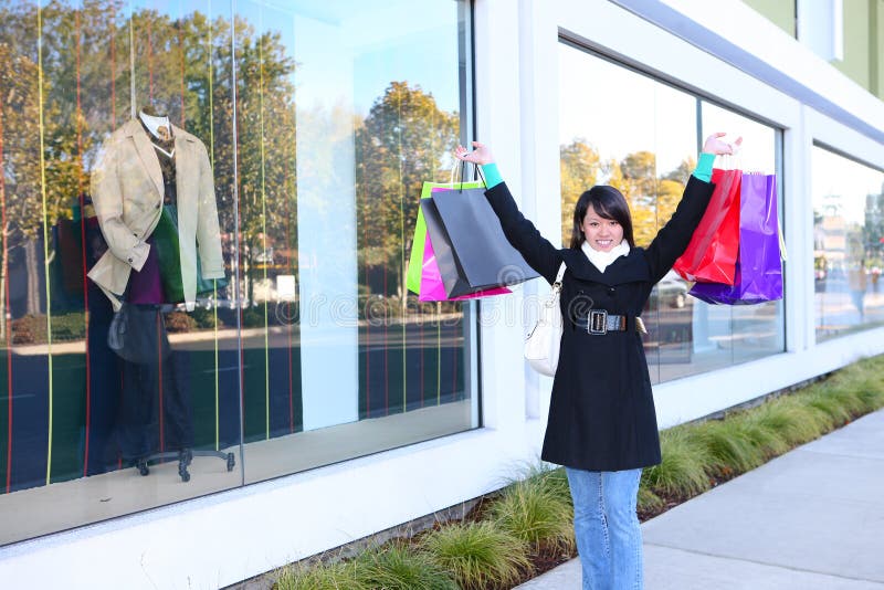 Pretty Woman Shopping with Colorful Bags