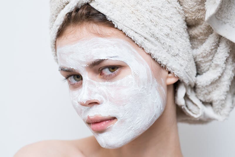 Pretty Woman with Towel on Head Cream Mask on Face Close Up Stock Image ...
