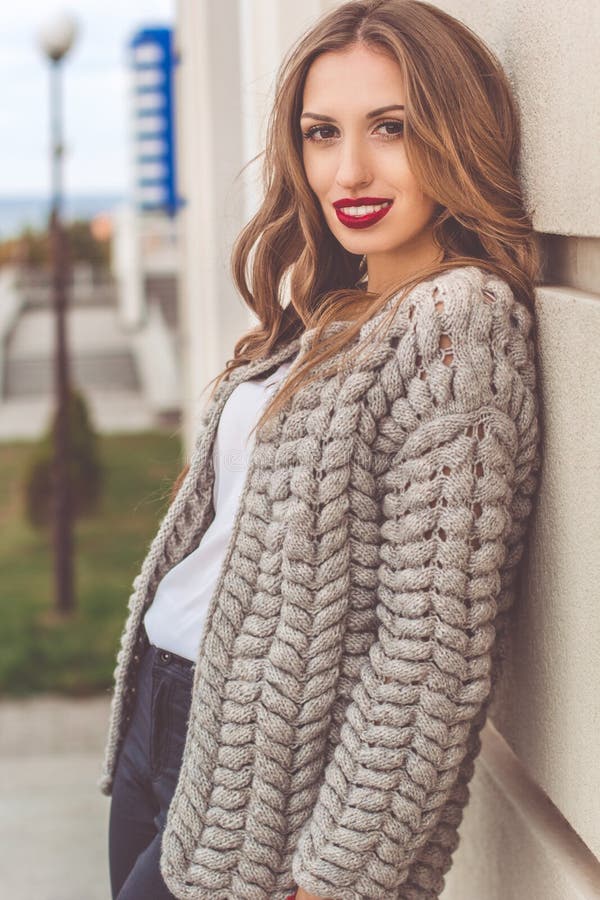  Pretty  Woman Is Wearing Cozy Knitted Sweater  Stock Image 