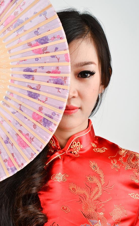 Pretty women with Chinese traditional dress Cheongsam and hole C