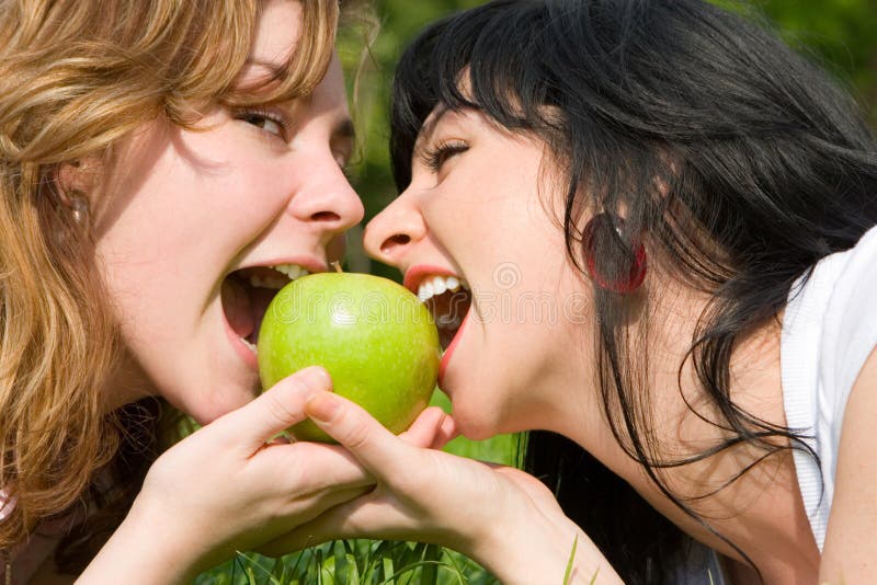 Pretty Women Eating Green Apples Stock Image Image of lifestyle