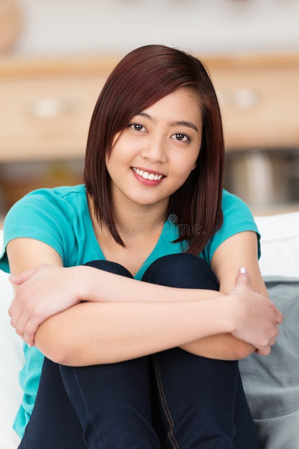 Pretty young Asian student with a sincere smile royalty free stock photography Pretty young Asian student with a sincere smile royalty free stock photography