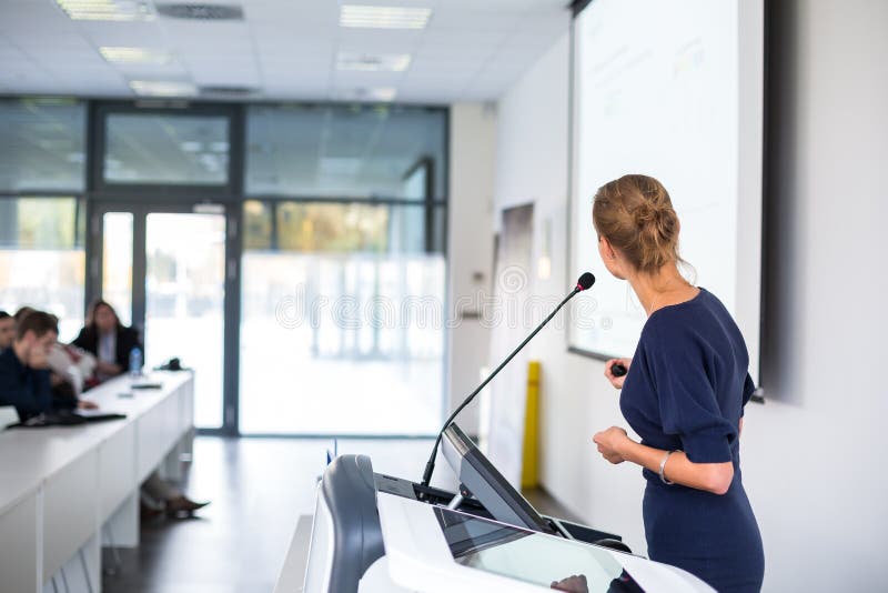 Pretty, young business woman giving a presentation stock photos Pretty, young business woman giving a presentation stock photos