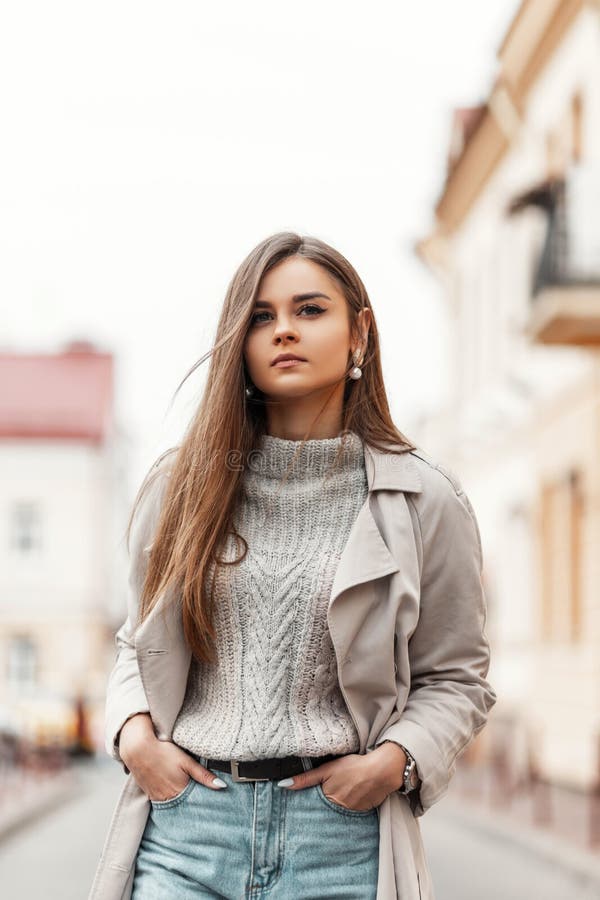 Pretty Young Fashionable Woman in Stylish Autumn-spring Clothes Walks on a  Street Near Vintage Buildings. Cute Girl Fashion Model Stock Photo - Image  of cute, clothing: 197029452