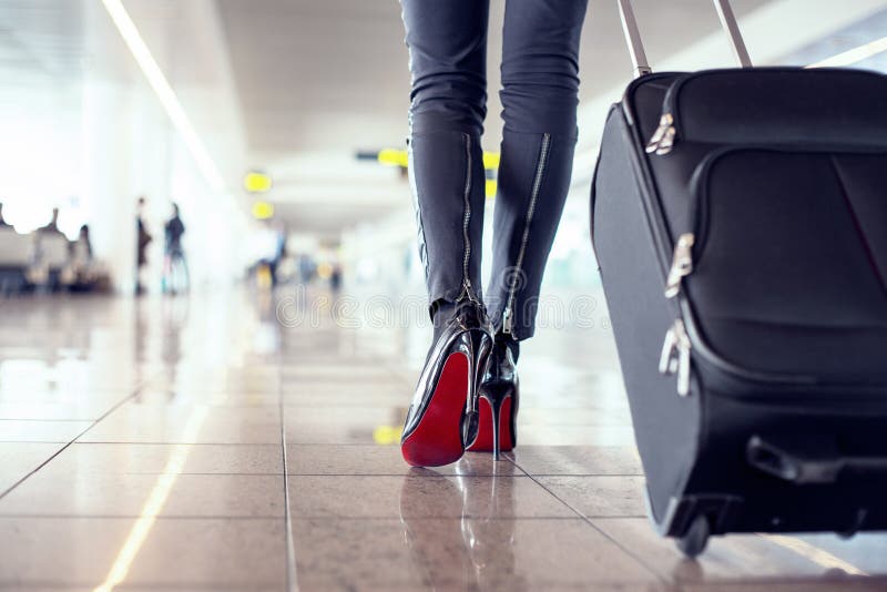 Pretty young female passenger at the airport