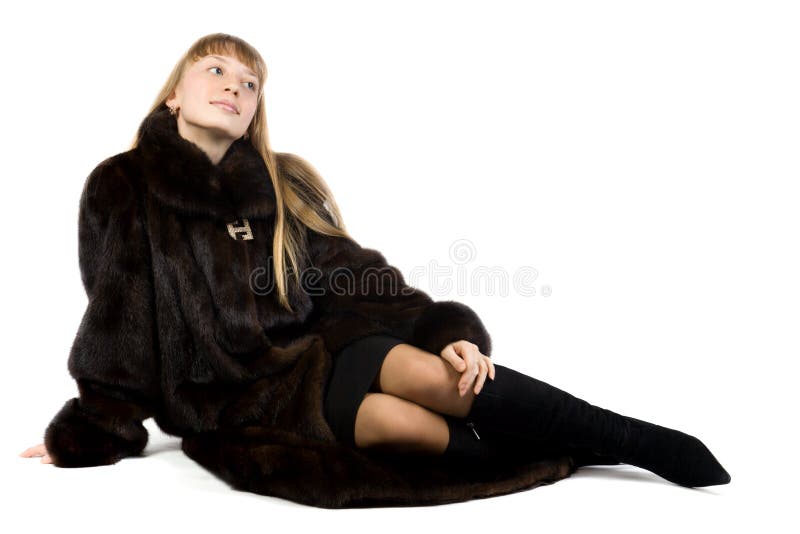 Pretty young girl in black fur jacket