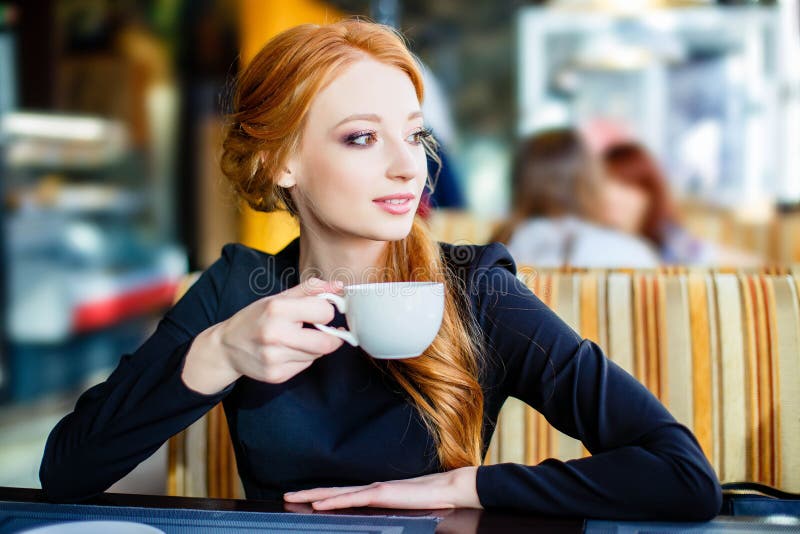 Pretty young girl in cafe. stock image. Image of eating 103522015