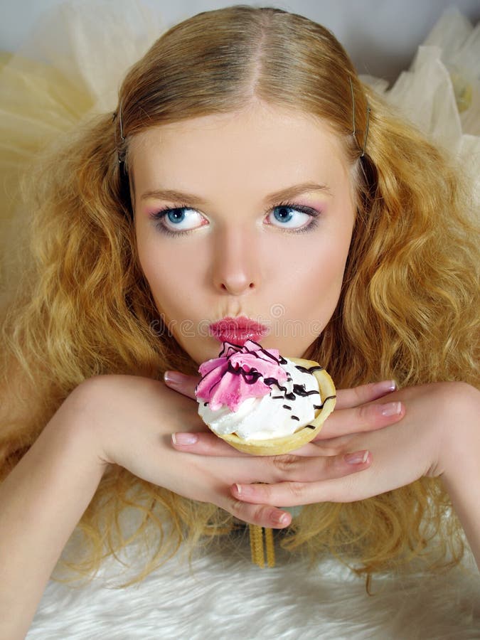 Pretty Young Girl with Cake Stock Photo Image of eyes, expression