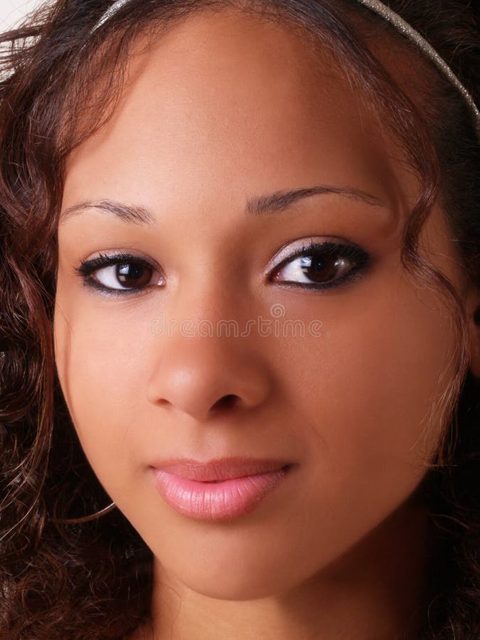 Pretty young teen black girl closeup portrait