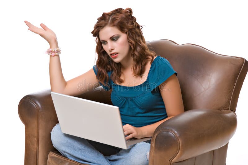 Pretty young woman frustrated with computer royalty free stock photo