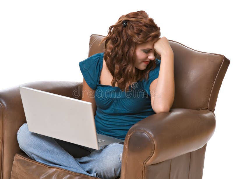 Pretty young woman frustrated with computer stock images