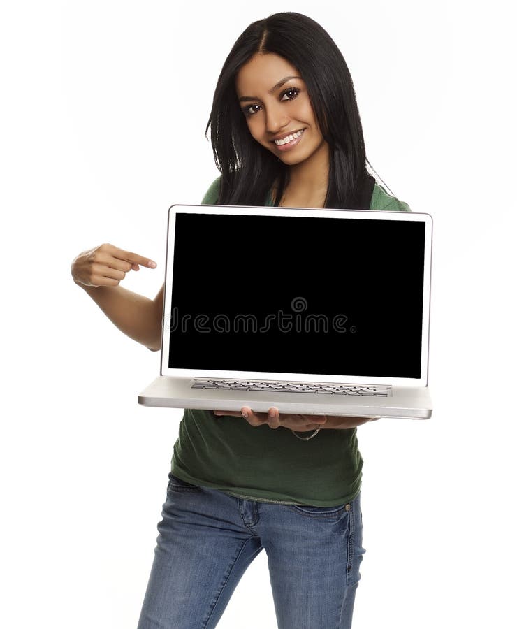 Pretty young woman holding laptop