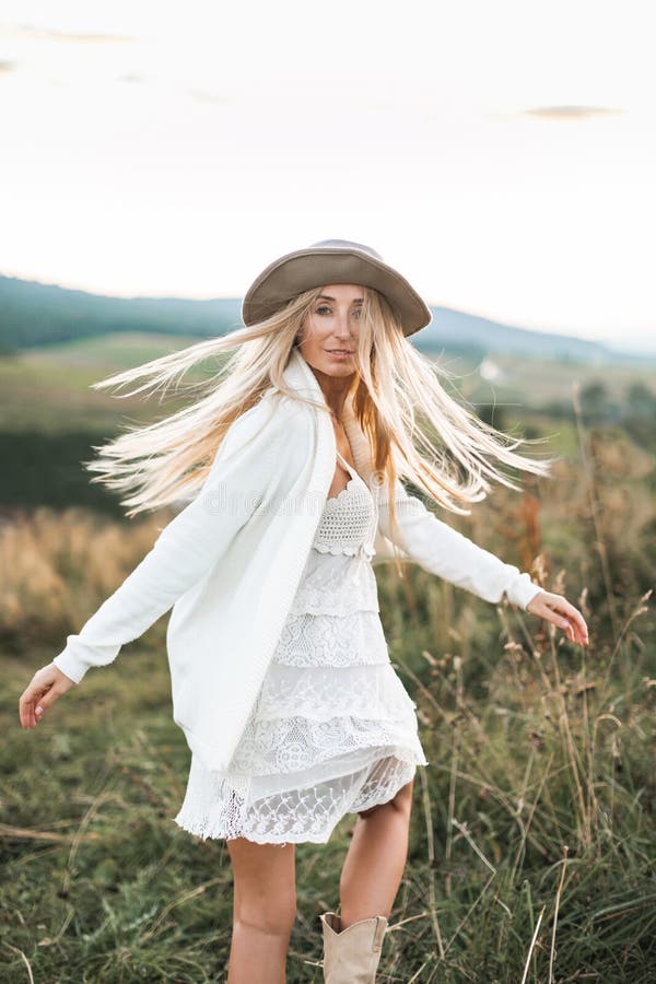 Pretty Young Woman with Long Blonde Hair, Wearing Stylish Cowboy Hat ...