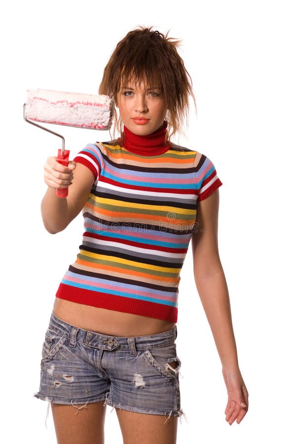 Pretty young woman with painting roller