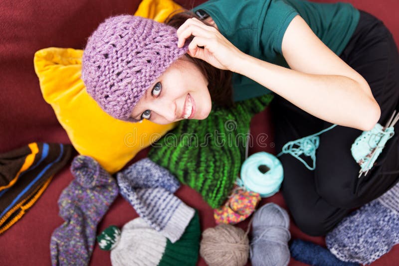 Pretty young woman with pink wool hat