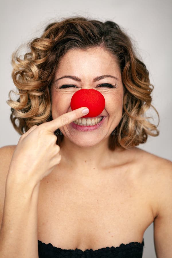 Pretty Young Girl Posing With A Clown Nose Stock Photo - Image of  articulate, action: 173381680