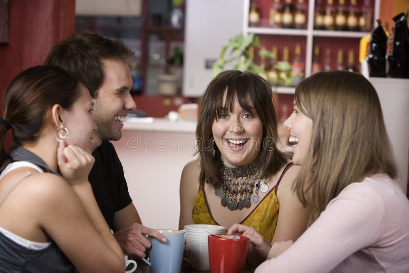 Pretty Young Woman Surrounded by Friends