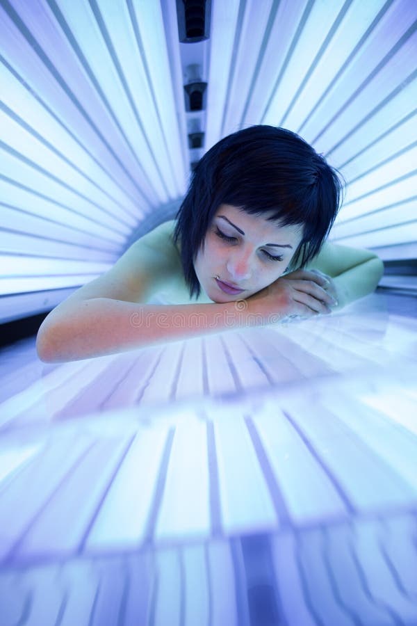 Young sexy girl sunbathing in the solarium in her underwear lying on the  bed. Generative AI 24032418 Stock Photo at Vecteezy