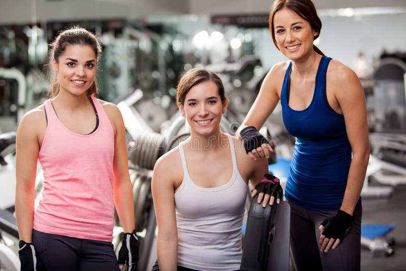 Pretty young women at the gym stock photo Pretty young women at the gym stock photo