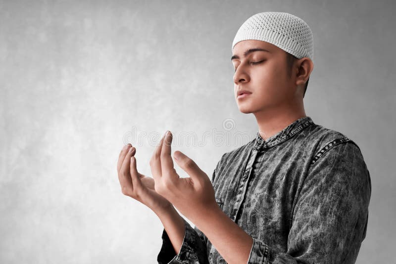 Pri?re musulmane asiatique religieuse d'homme photo stock Pri?re musulmane asiatique religieuse d'homme photo stock