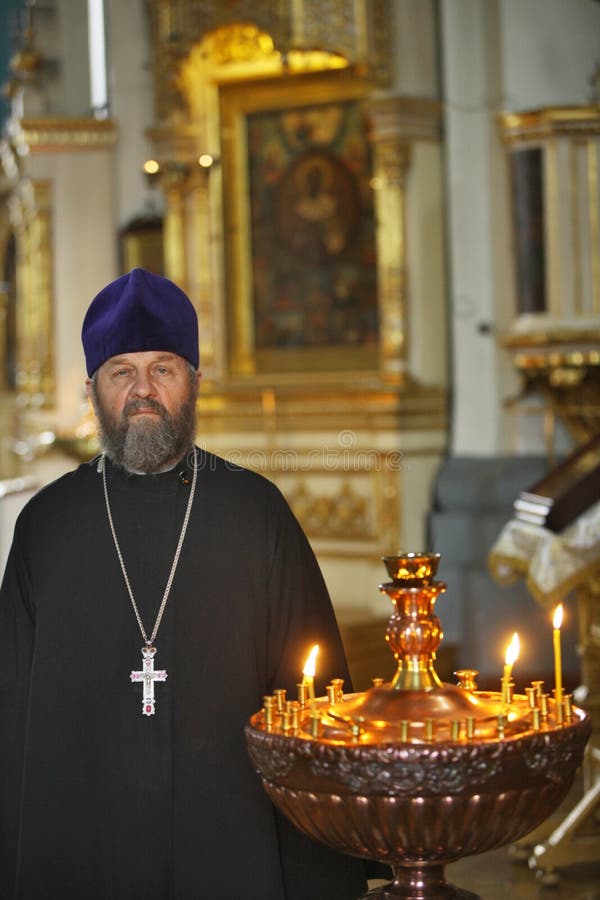 A priest in an Orthodox church.