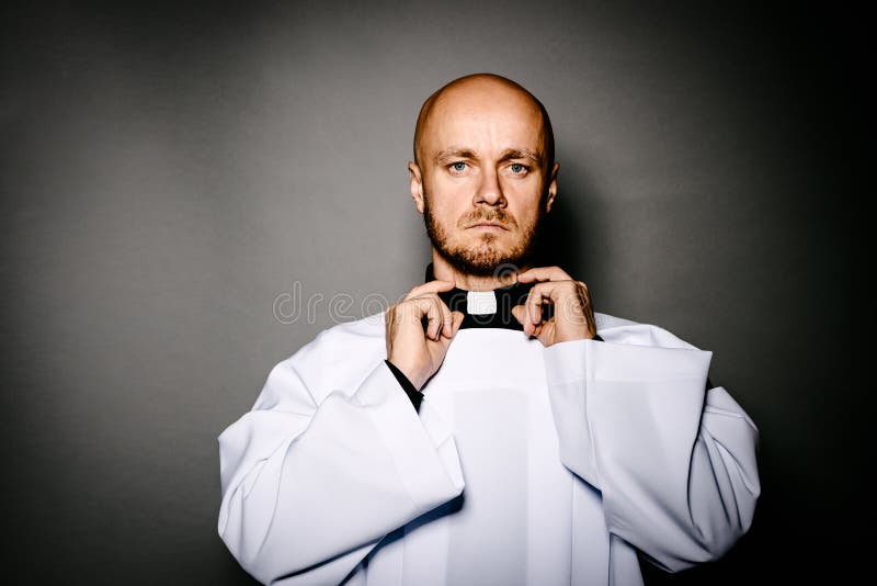 Priest in White Surplice Correcting His Collar Stock Image Image of