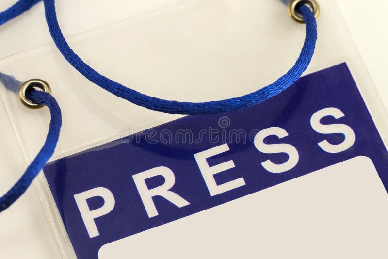 Primer azul de la tarjeta de la identificación del pase de prensa imagen de archivo Primer azul de la tarjeta de la identificación del pase de prensa imagen de archivo