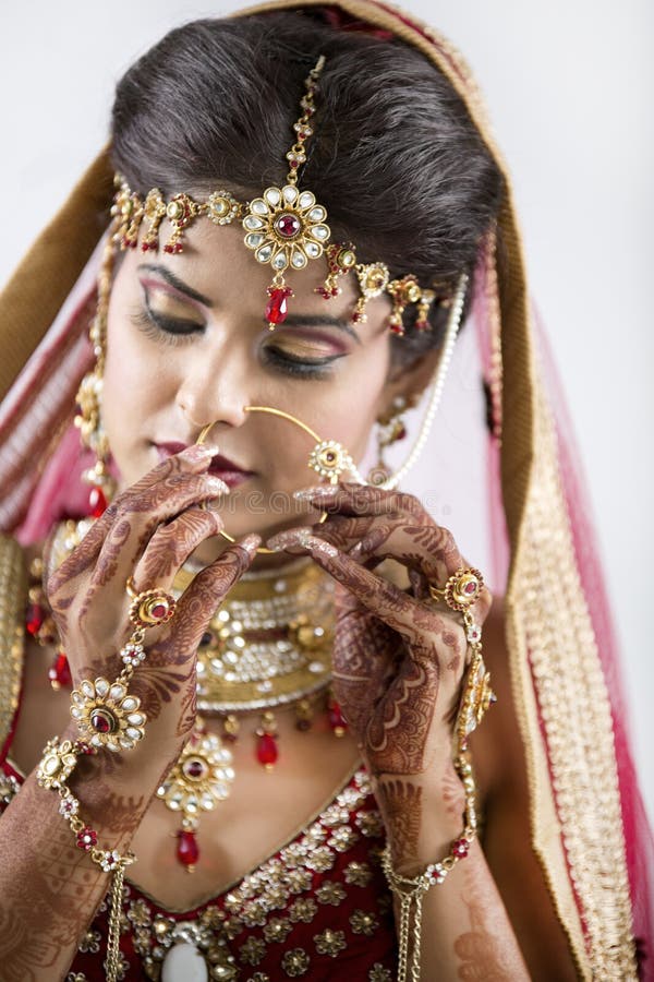 Beautiful Indian Bride in jewelry and henna. Beautiful Indian Bride in jewelry and henna