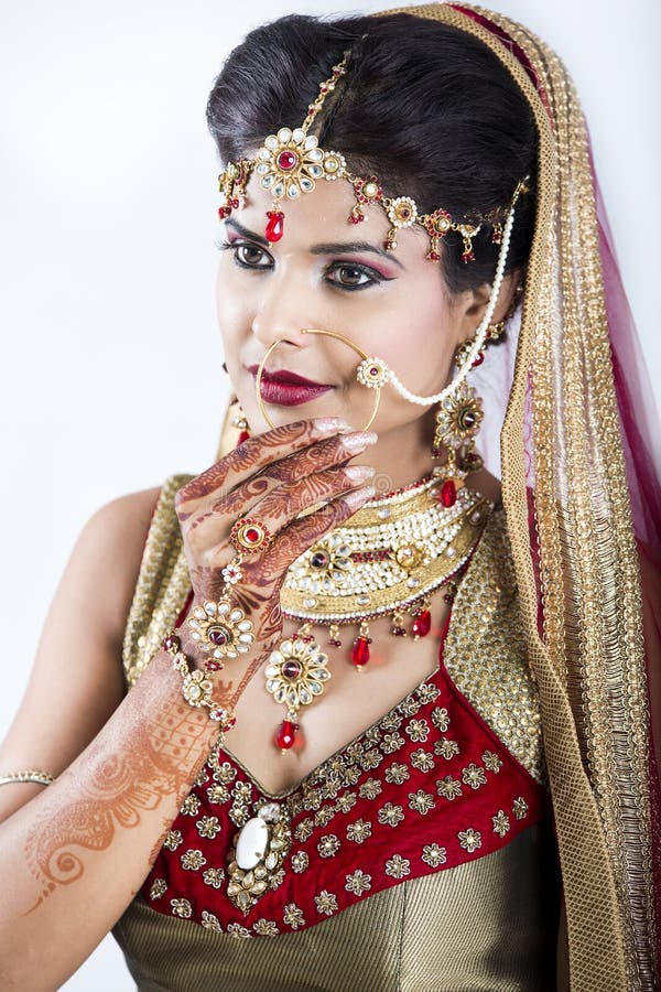 Beautiful Indian Bride in jewelry and henna. Beautiful Indian Bride in jewelry and henna