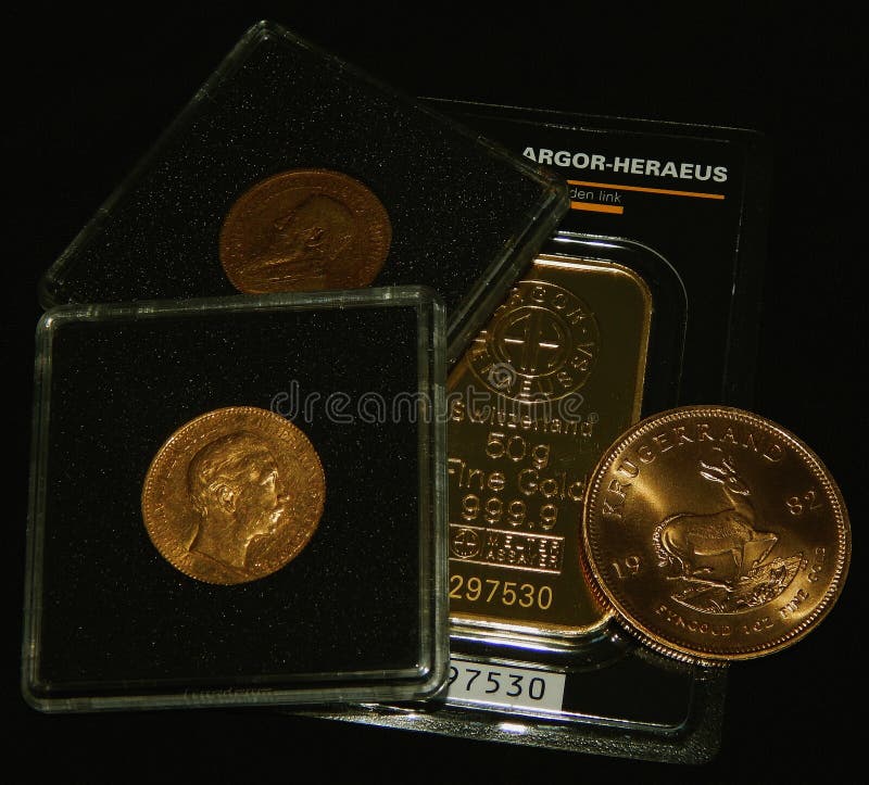 Gold bar and Gold coins as a symbol of certainty. Gold bar and Gold coins as a symbol of certainty.