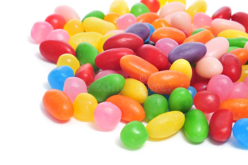 Closeup of a pile of jelly beans of different colors on a white background. Closeup of a pile of jelly beans of different colors on a white background