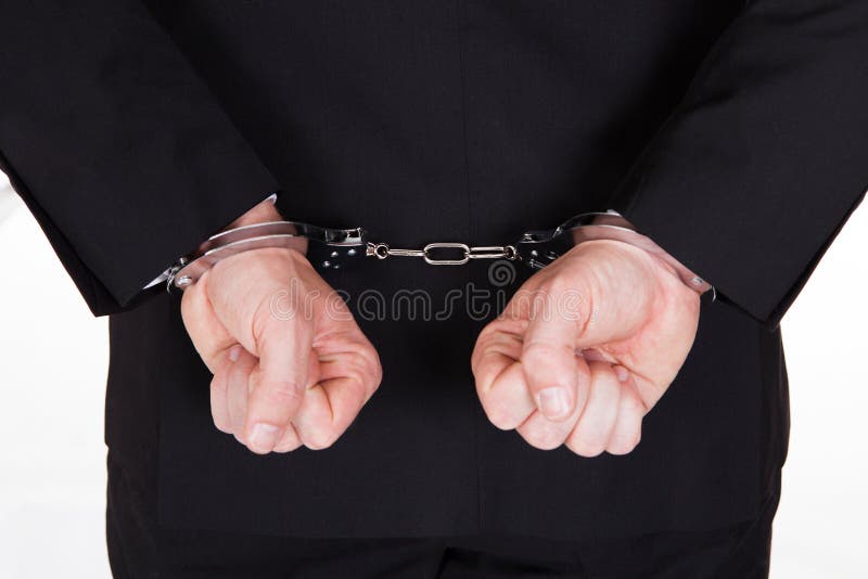 Primer del hombre de negocios arrestado imagen de archivo libre de regalías Primer del hombre de negocios arrestado imagen de archivo libre de regalías