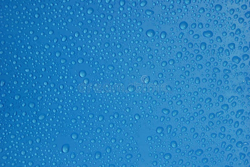primo piano blu del fondo di struttura di colore delle gocce di acqua
