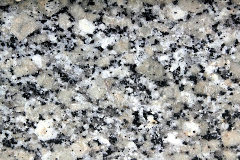Primo piano di struttura della pietra del nero di bianco grigio del granito immagine stock libera da diritti Primo piano di struttura della pietra del nero di bianco grigio del granito immagine stock libera da diritti
