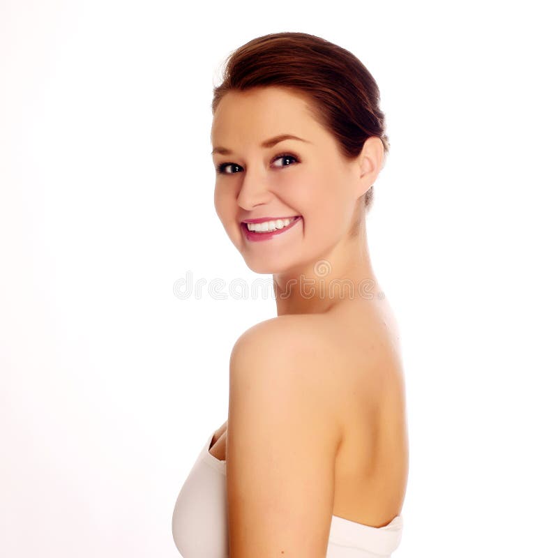 Primo piano di un sorridere della giovane donna immagine stock libera da diritti Primo piano di un sorridere della giovane donna immagine stock libera da diritti
