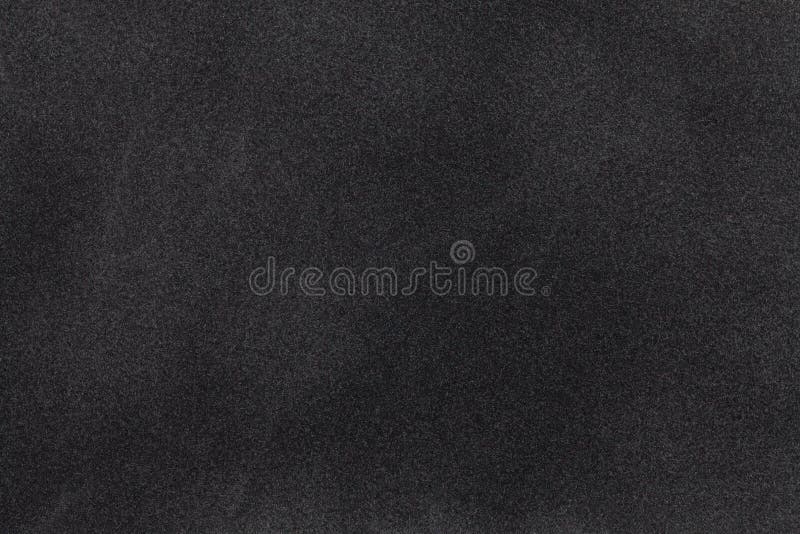 Primo piano nero del tessuto della pelle scamosciata Struttura del velluto fotografia stock libera da diritti Primo piano nero del tessuto della pelle scamosciata Struttura del velluto fotografia stock libera da diritti