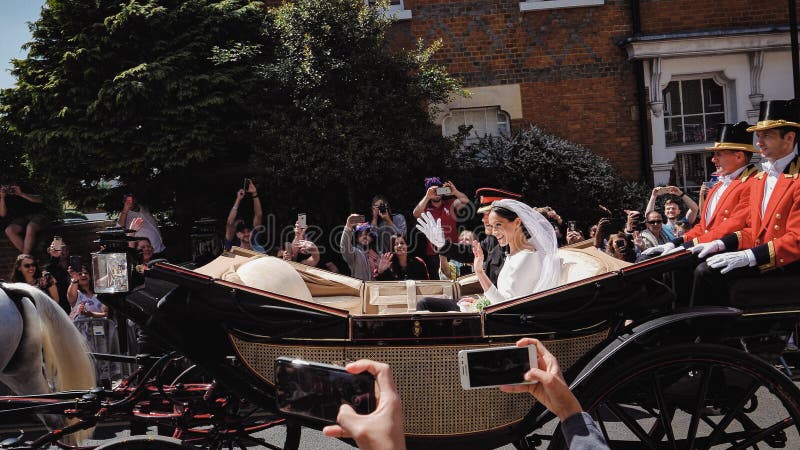 Prins Harry, hertig av Sussex och Meghan, hertiginna av Sussex tjänstledigheter arkivfoto Prins Harry, hertig av Sussex och Meghan, hertiginna av Sussex tjänstledigheter arkivfoto