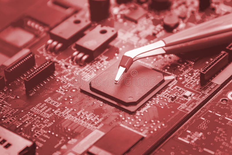 Printed Circuit Board with Many Electrical Components Stock Photo