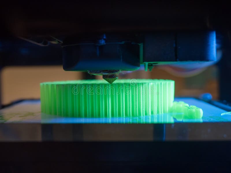 Printer Printing a Green 3d Object Stock Photo - Printer Printing Green D Object PrintheaD Layers Dimensional Pla Filament 113110362